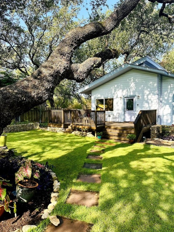 a swimming pool with outdoor seating and yard