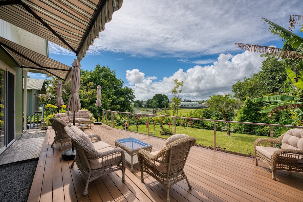 Back lanai with  Aleko retractable patio awnings.