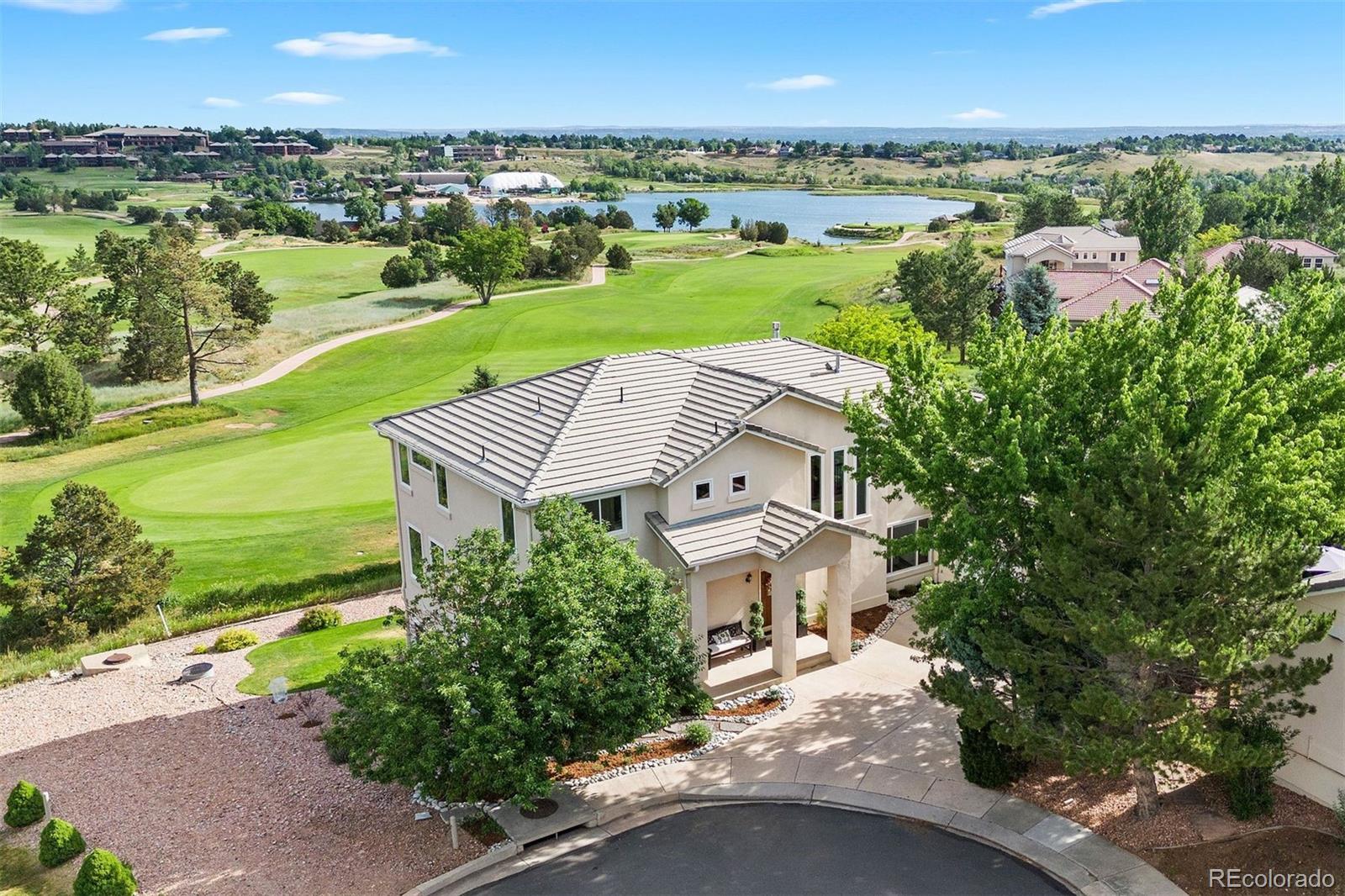 an aerial view of a house with a garden