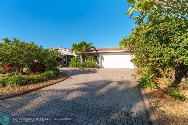 $900,000 | 5779 Northeast 17th Terrace | Coral Ridge Isles