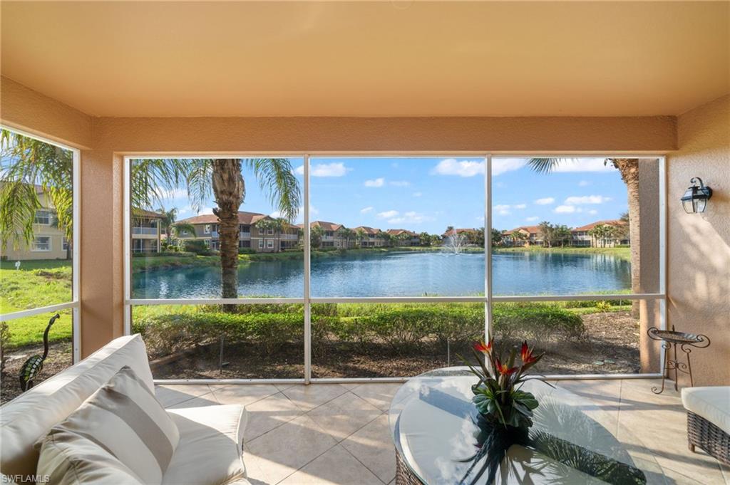 a view of a porch with a floor to ceiling windows