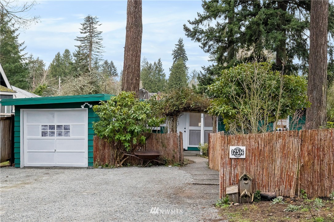 a house with a tree in front of it