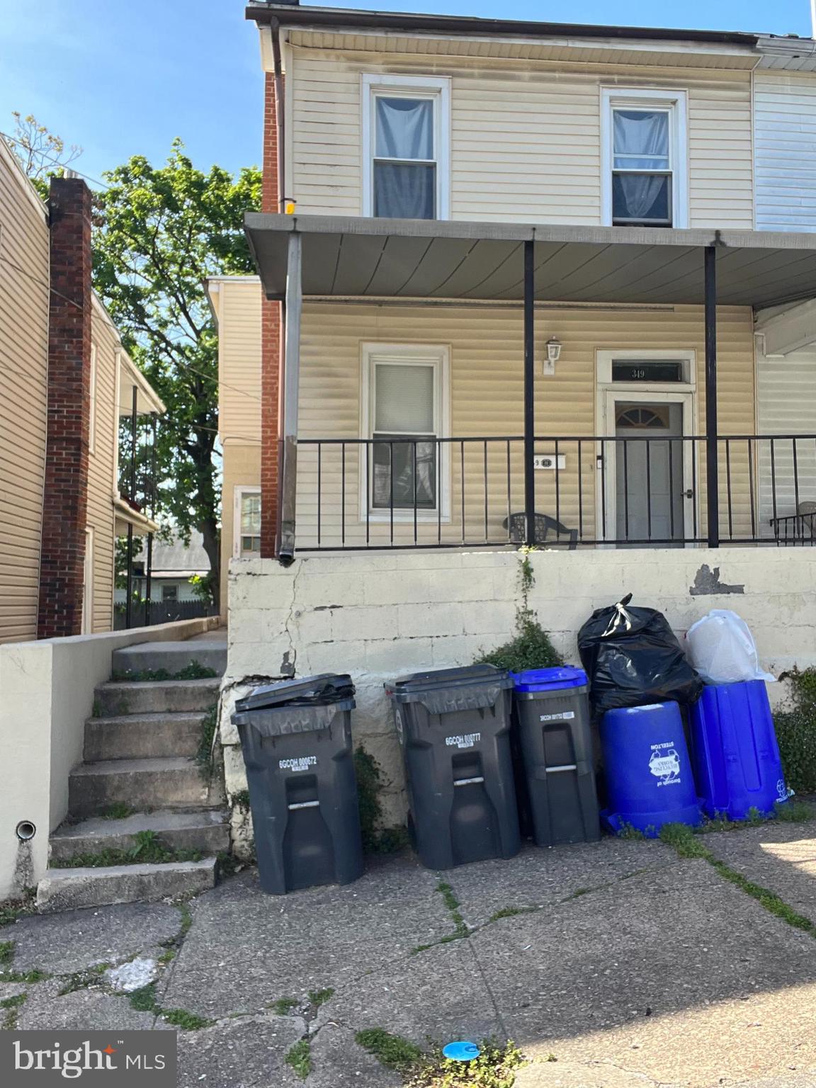 a front view of a house with parking space