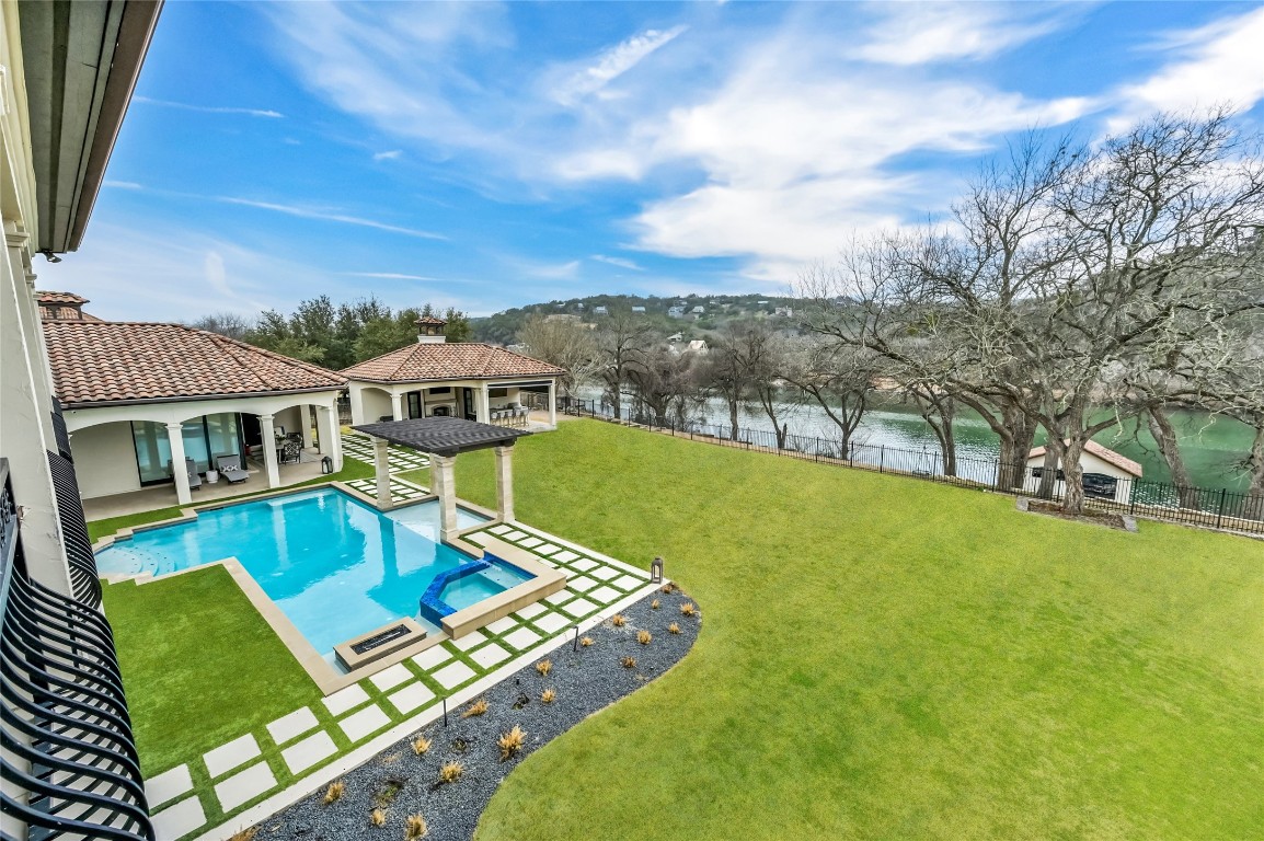 swimming pool view with a outdoor seating