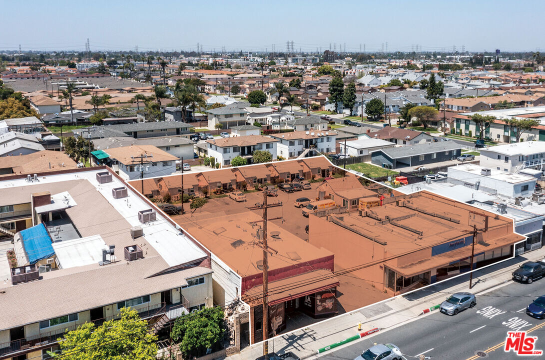 an aerial view of a house with a city view