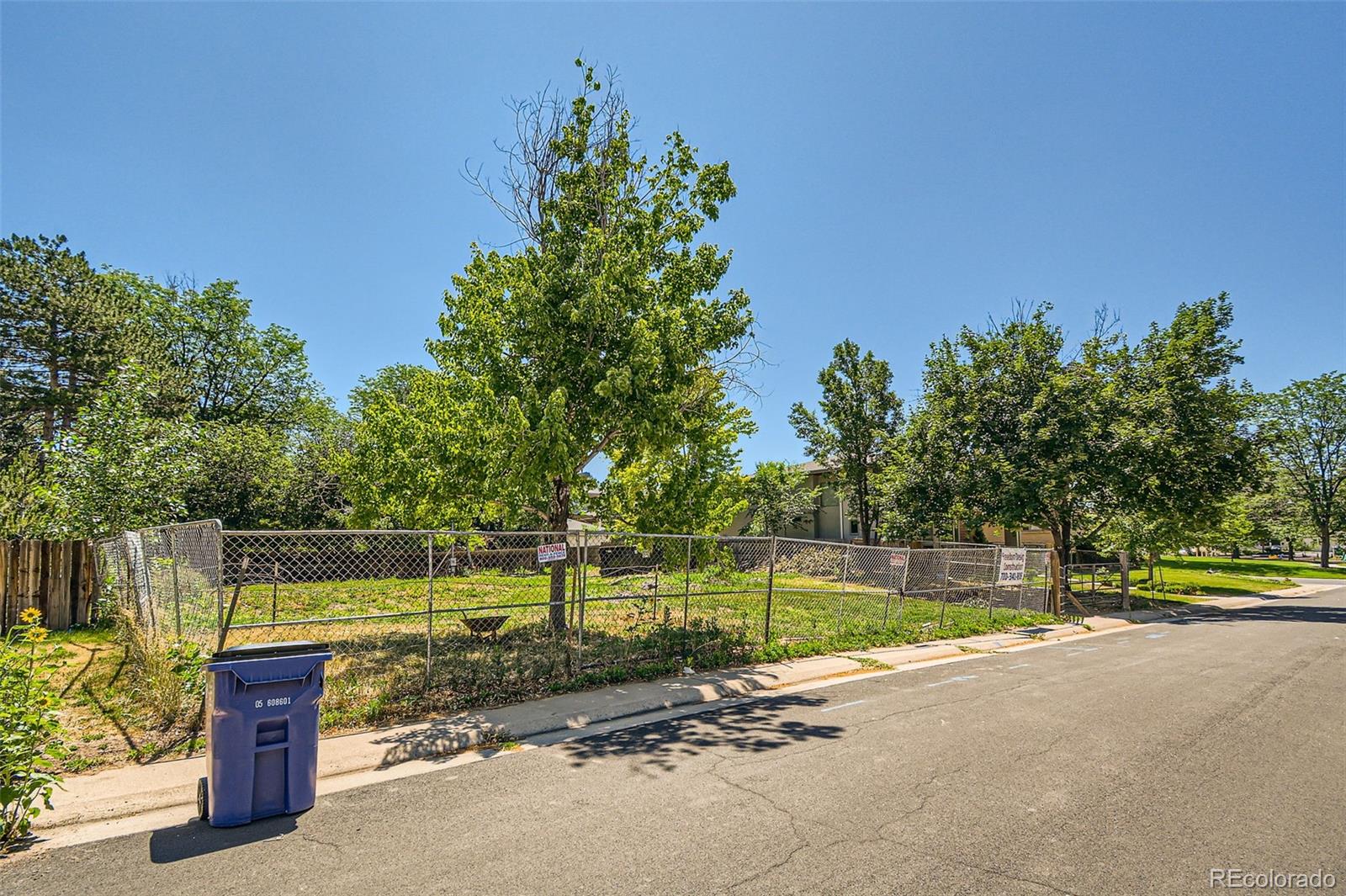 a view of a lake with a yard