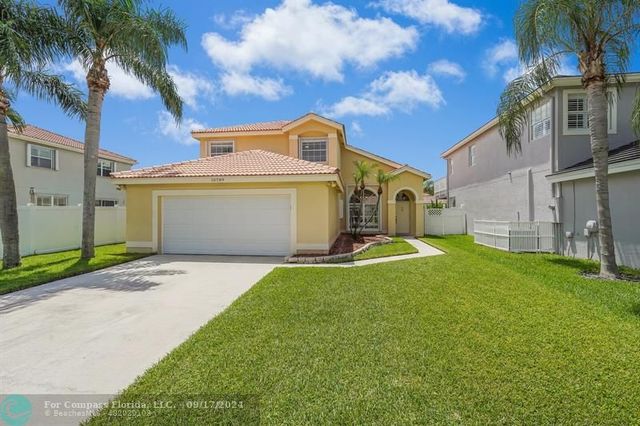 $700,000 | 10789 Crescendo Circle | Lakes at Boca Raton