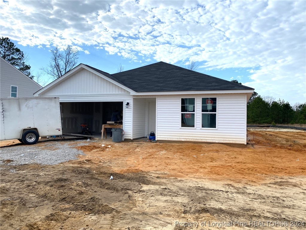 a house with yard in front of it