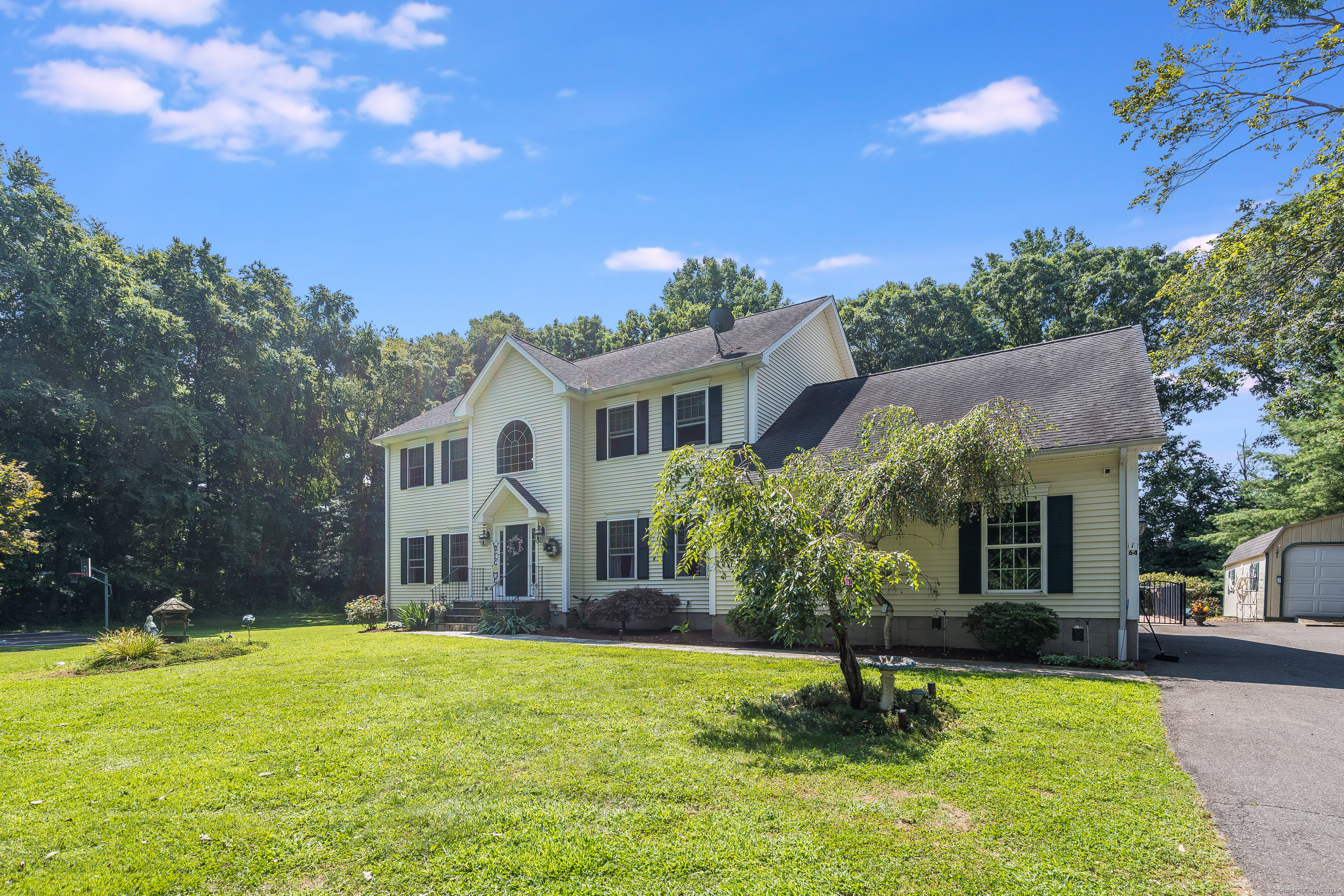 64 Tranquility Way. A spacious center hall colonial featuring an open floor plan, expansive property with plenty of privacy.