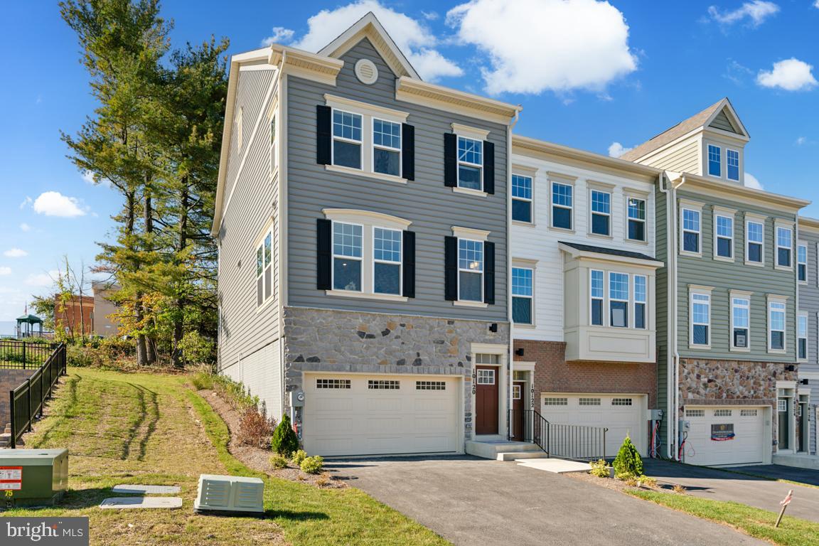 a front view of a multi story residential apartment building