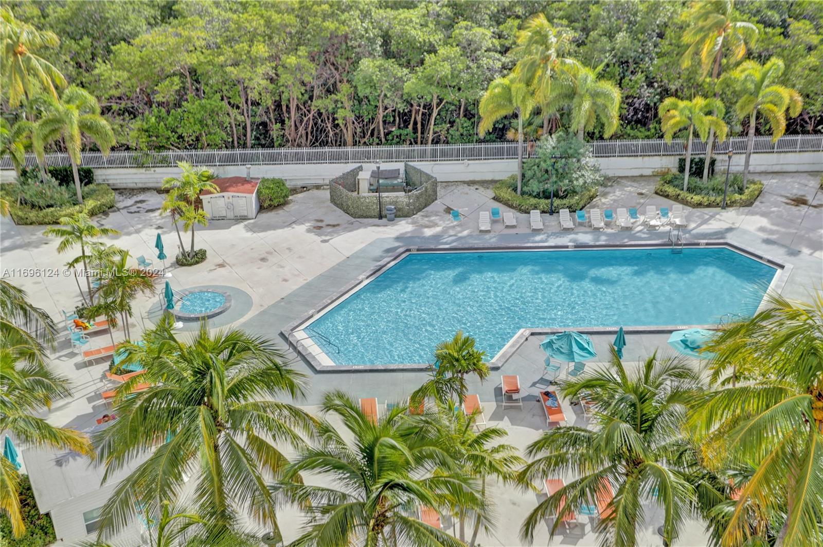 a view of a swimming pool with a patio