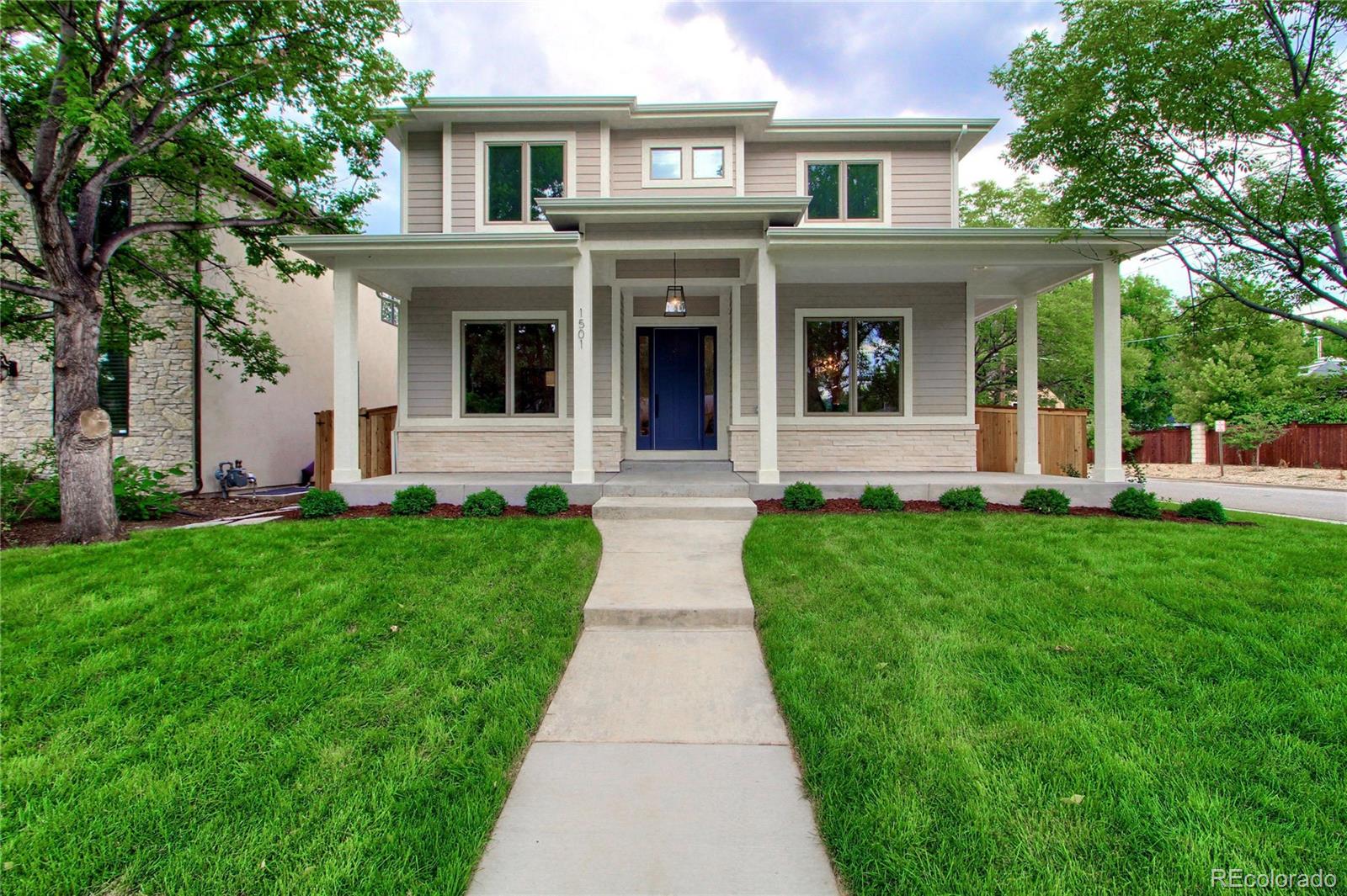 front view of a house with a yard