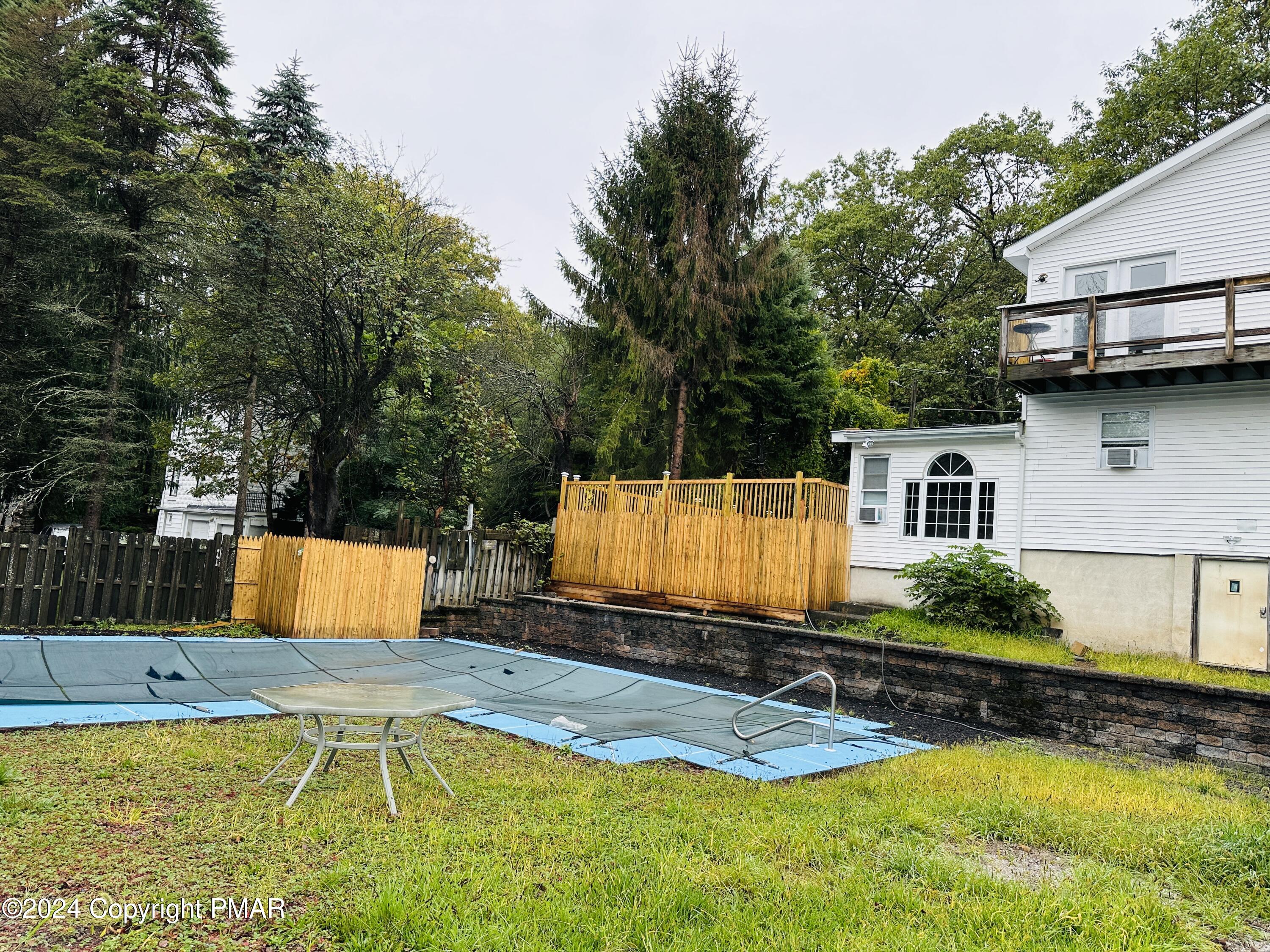 swimming pool with outdoor seating