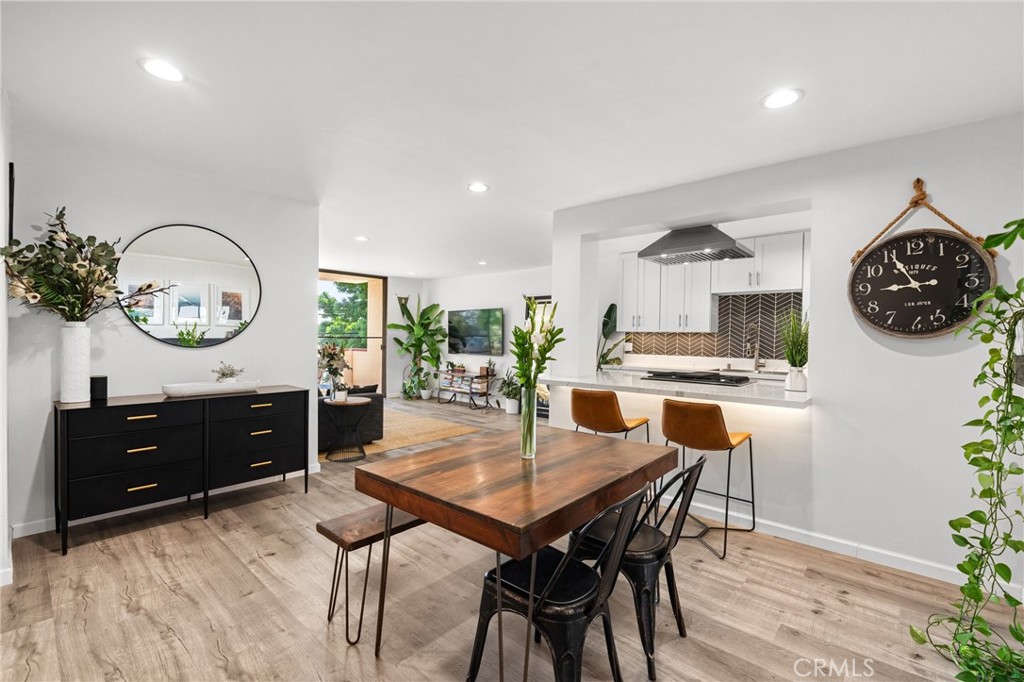 a kitchen with a table and chairs in it