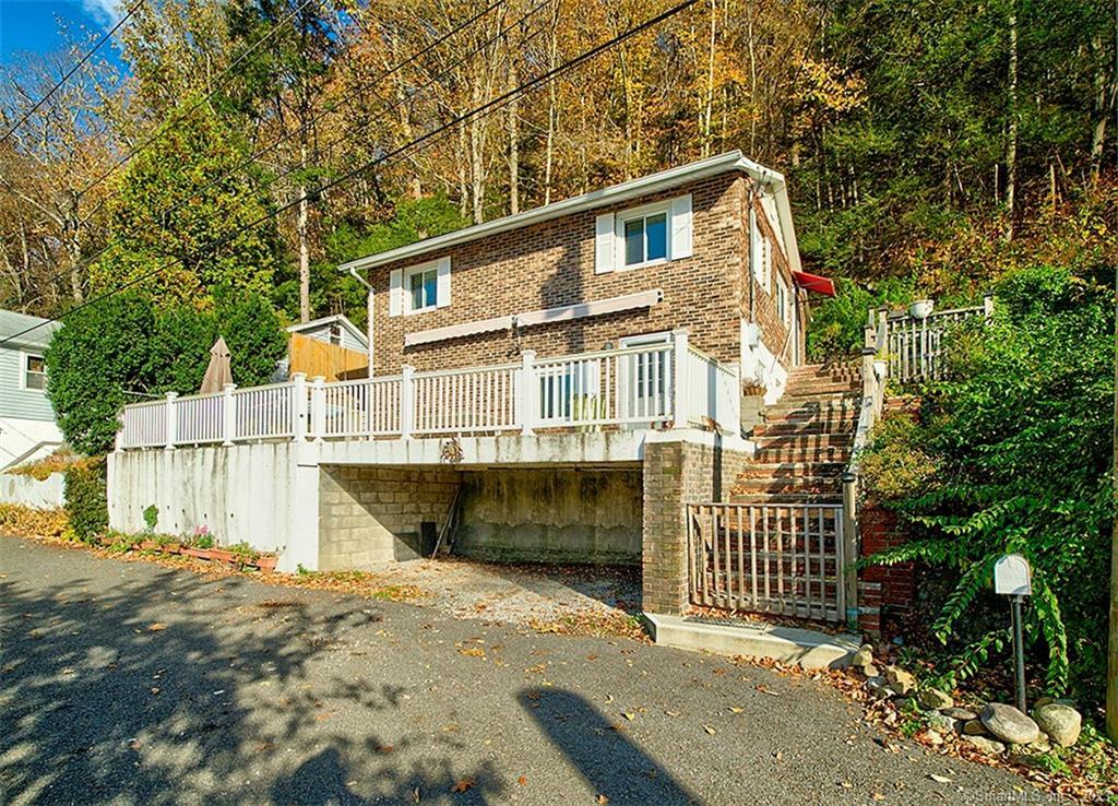 a front view of a house with a garage