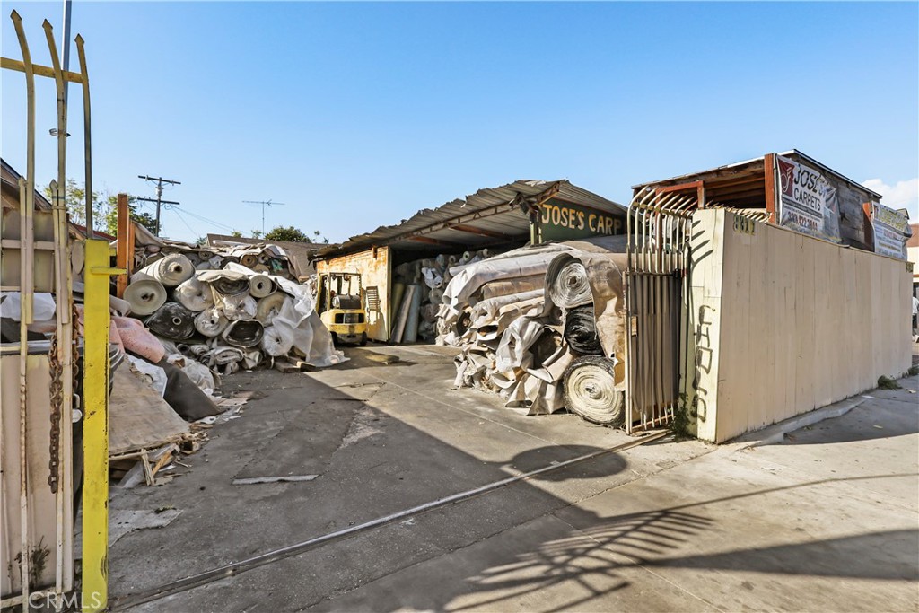 a view of a garage with parked cars