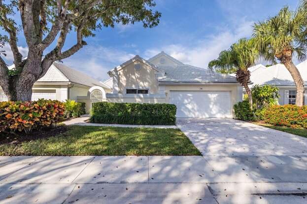 a view of a big yard in front of house