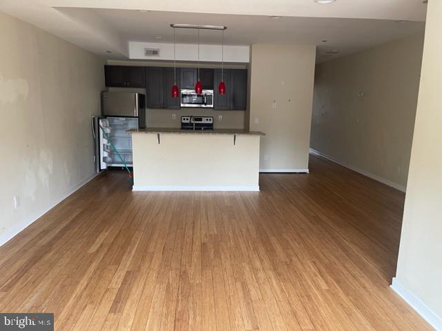 a living room with a couch and a flat screen tv