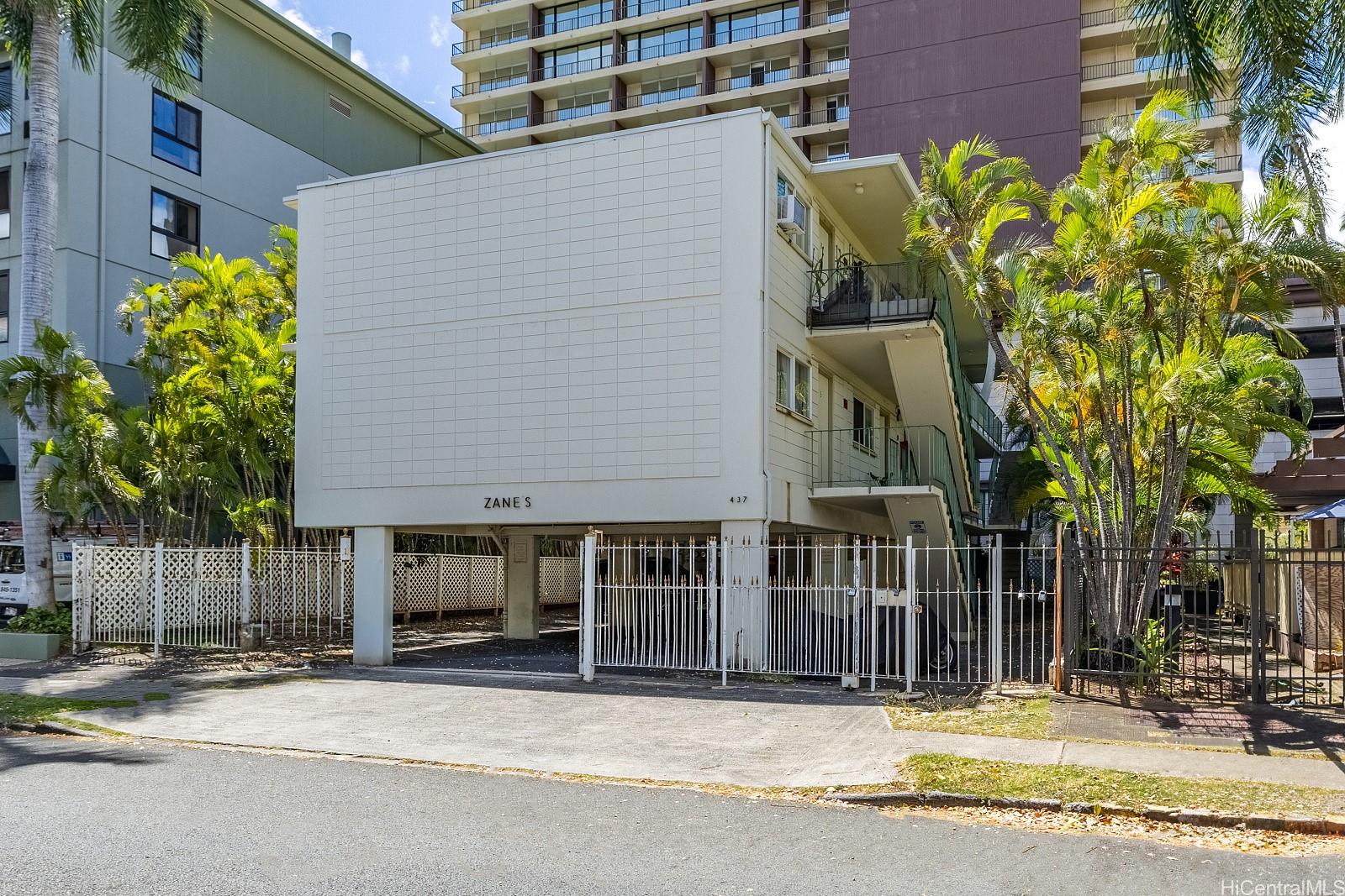 a view of a house with a street