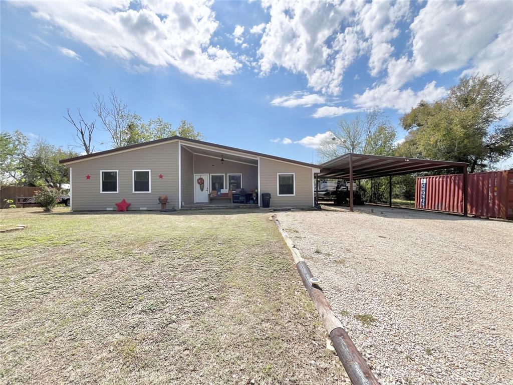 a front view of house with yard