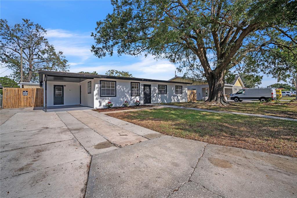 front view of a house with a big yard