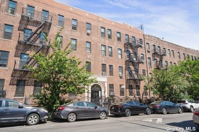 a car parked in front of a building