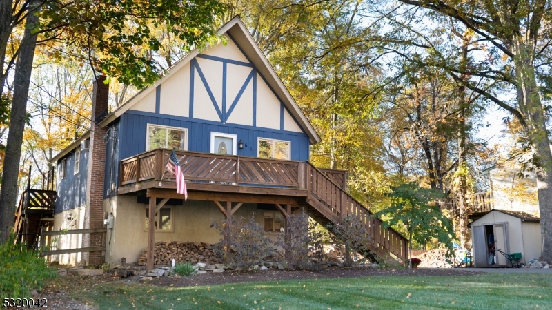 a house that has tree in front of it