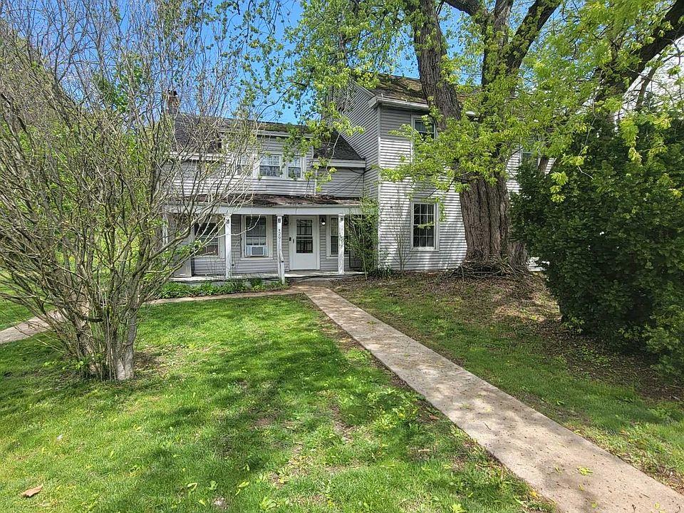 a house view with a garden space