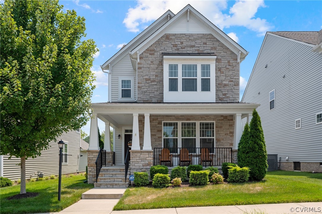 front view of a house with a yard