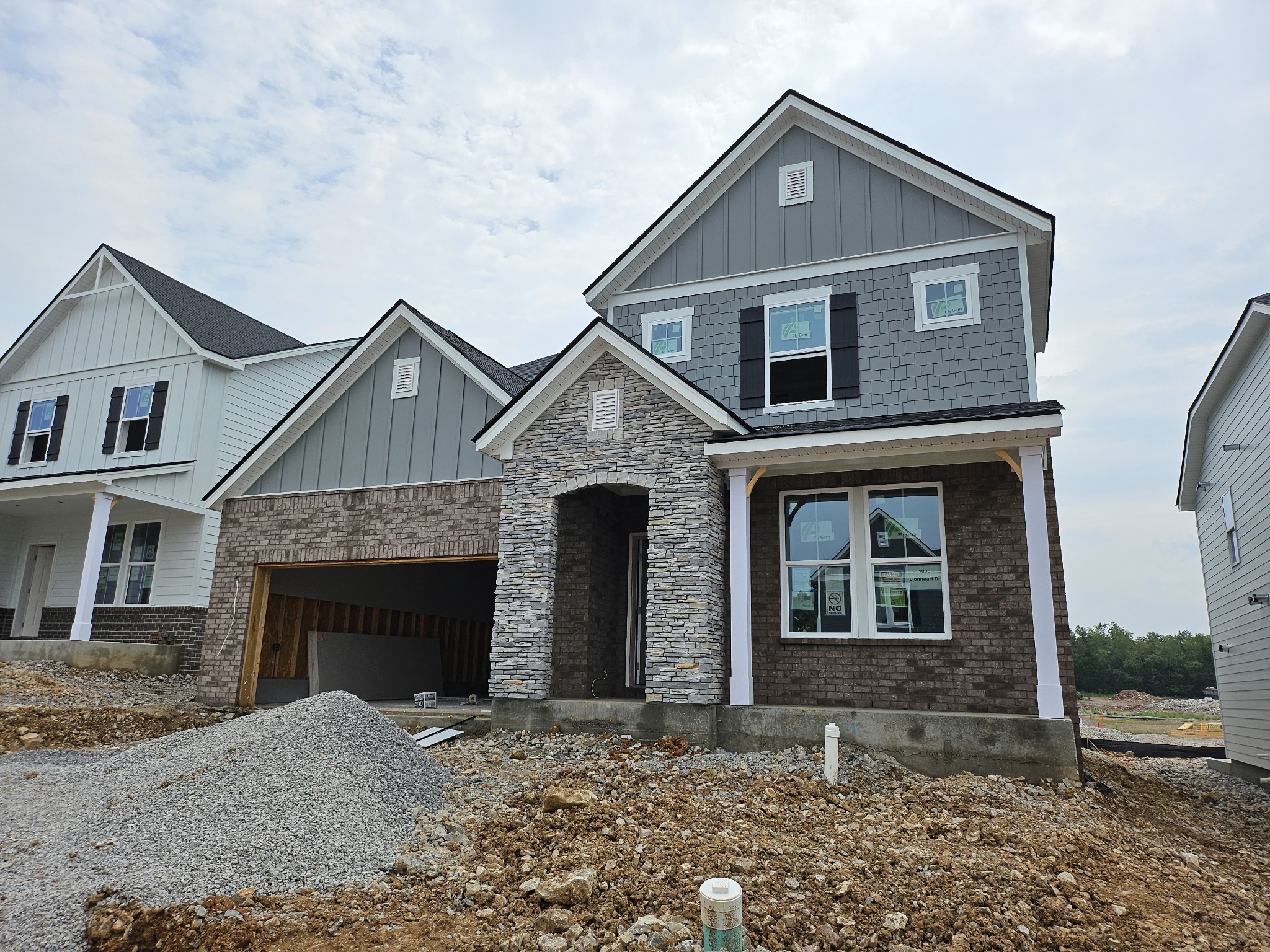 a front view of a house with yard