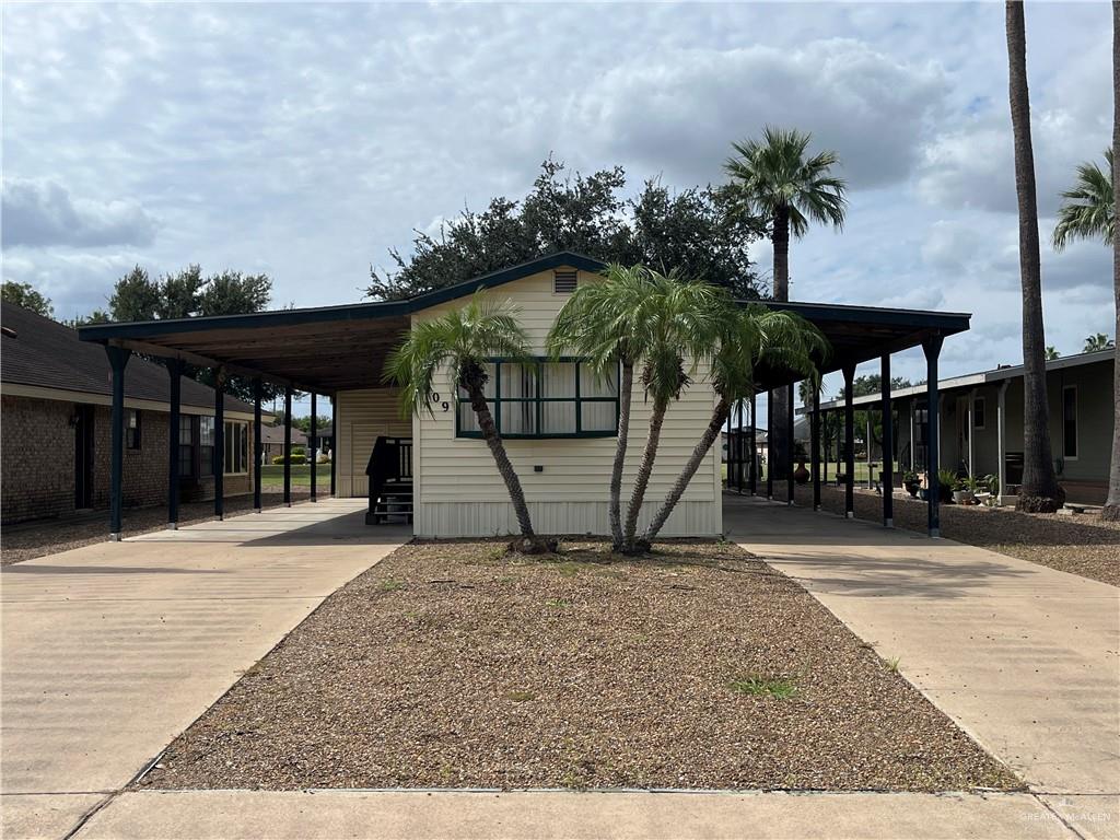 a front view of a house having yard