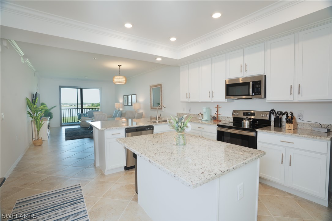 a large kitchen with granite countertop lots of counter top space