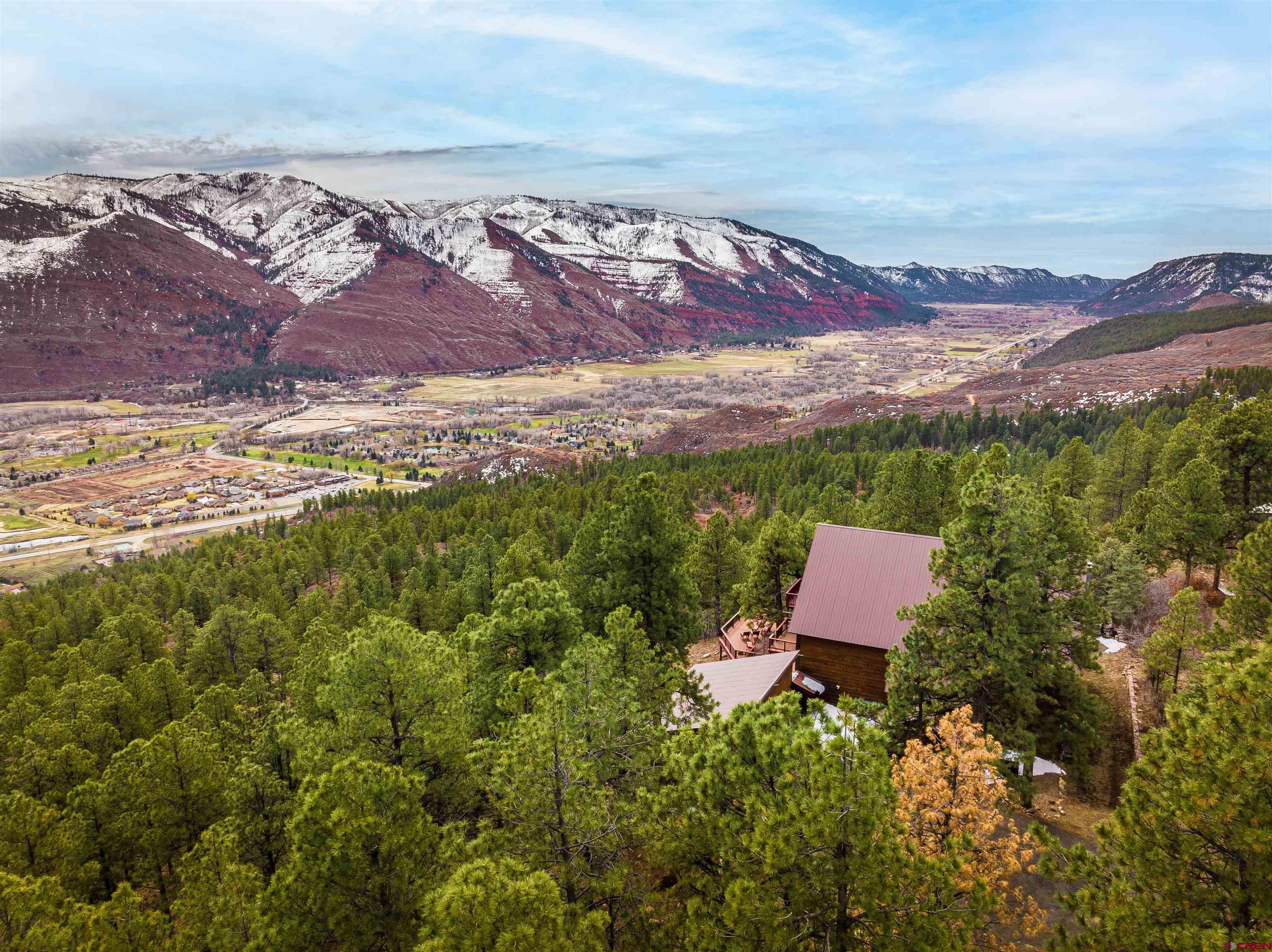 an aerial view of residential house with outdoor space