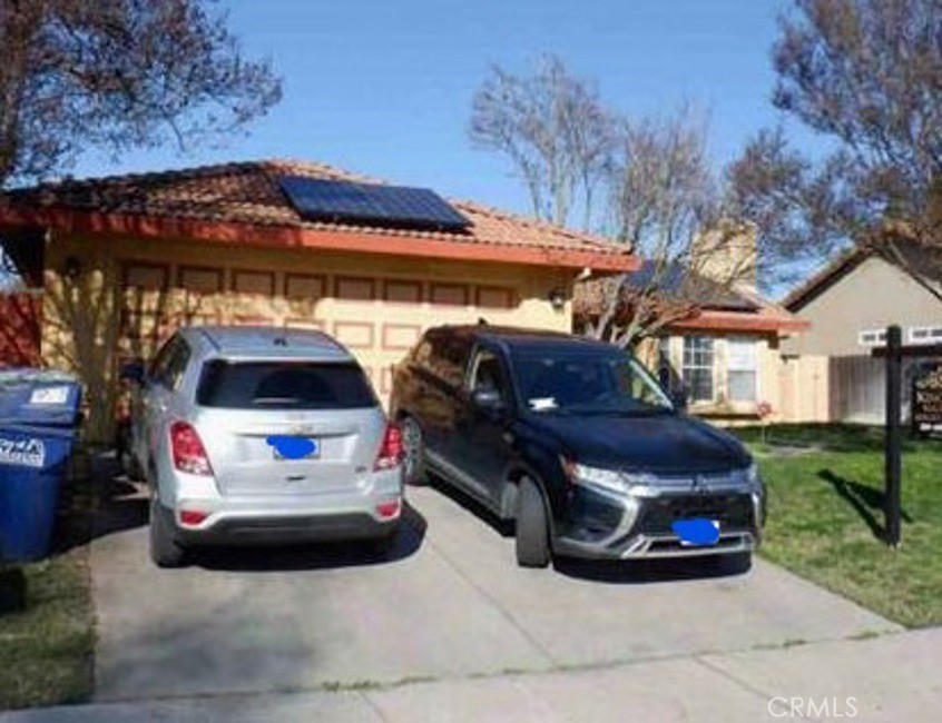 a car parked in front of a house