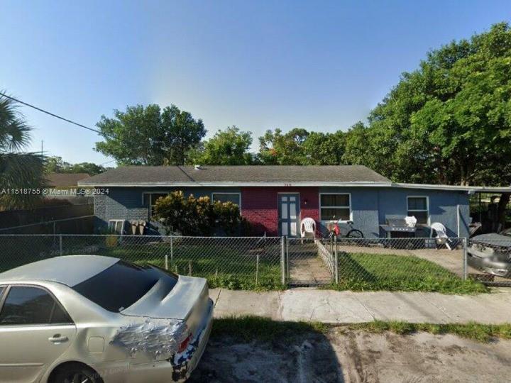 a view of a yard with furniture