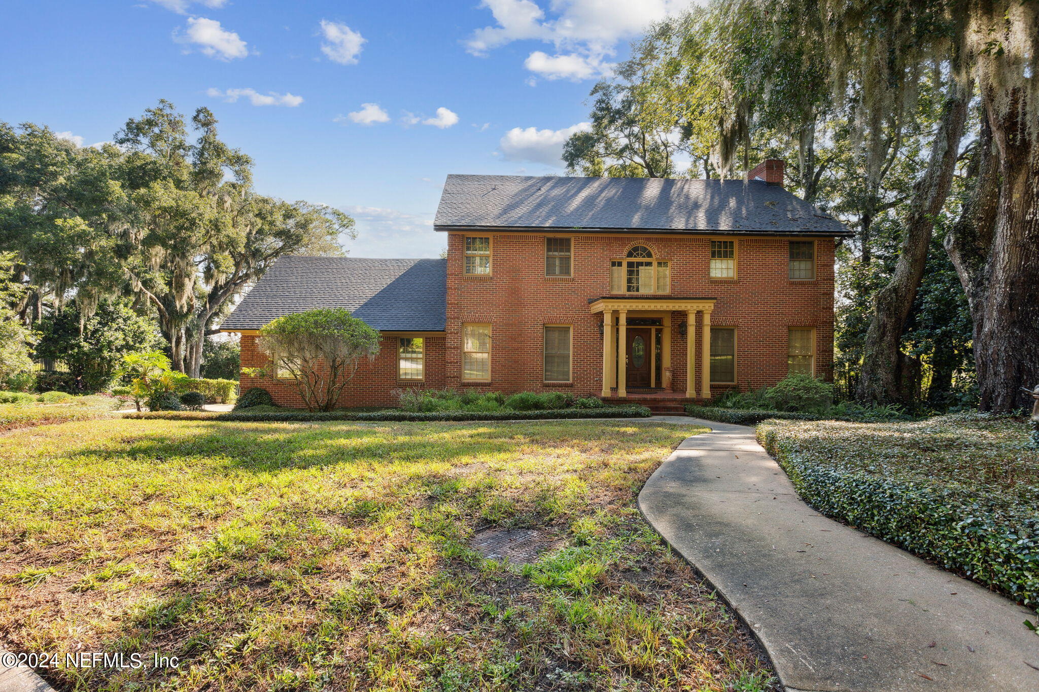 a front view of house with yard