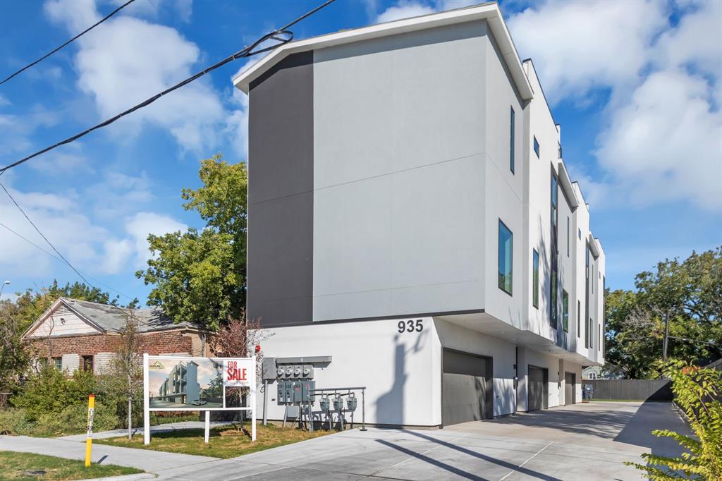 a front view of a building with street view