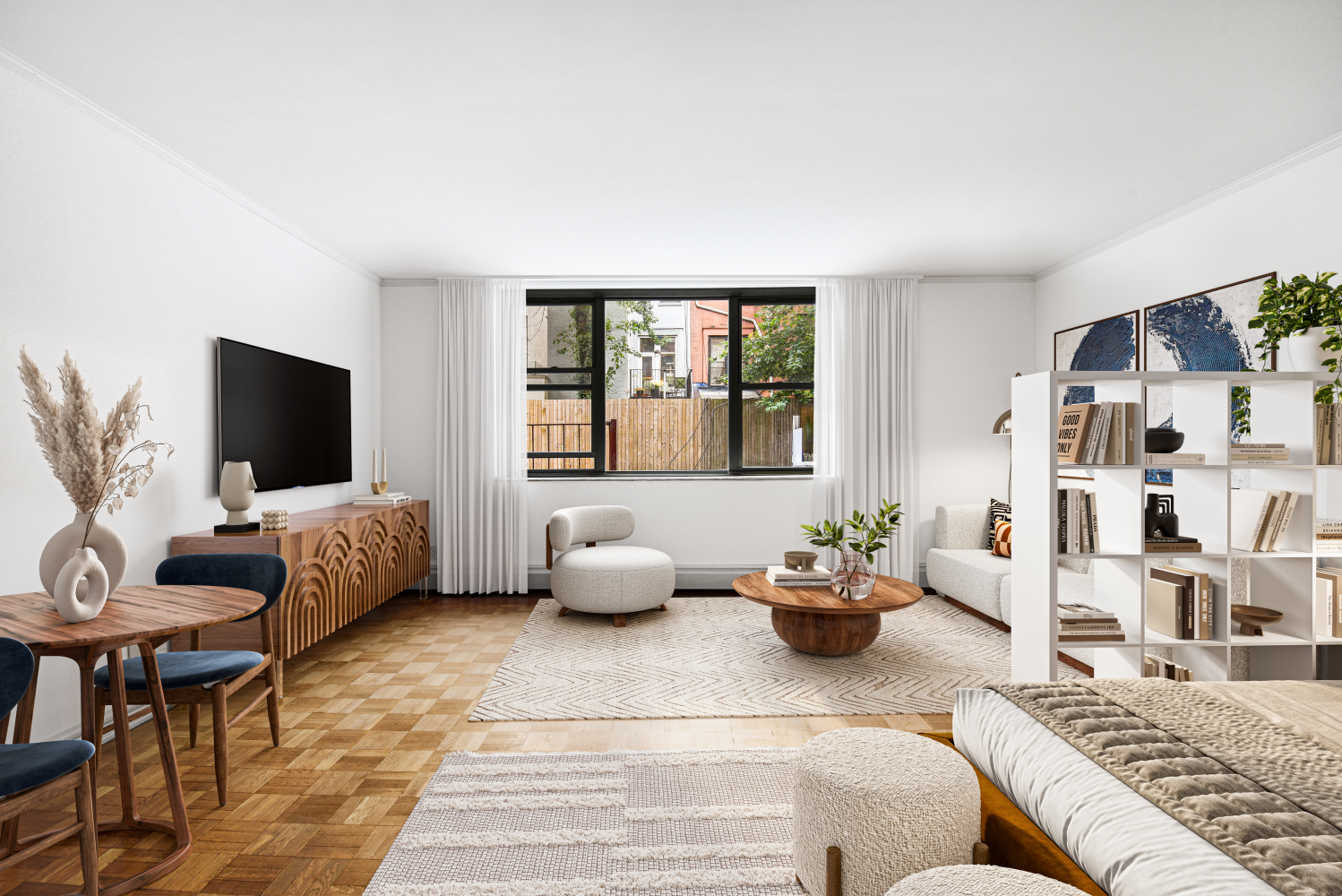 a living room with furniture and a flat screen tv