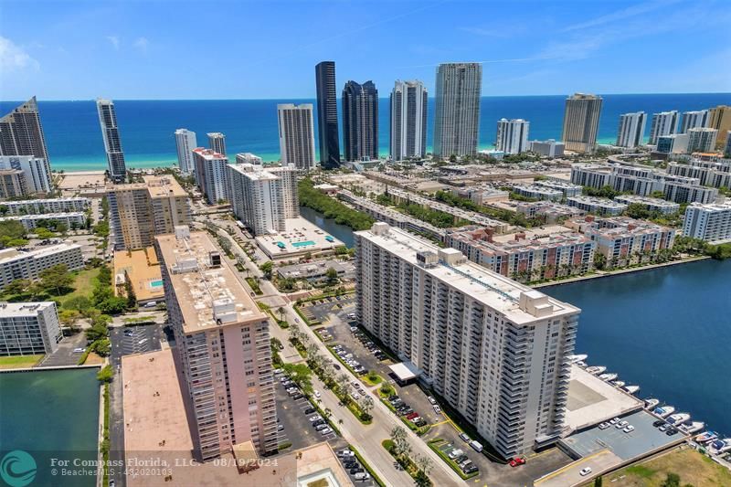 a view of a city with tall buildings