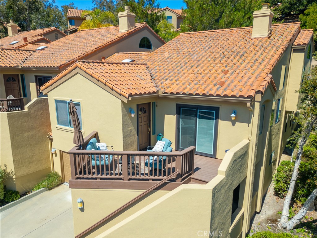 a view of a house with roof deck