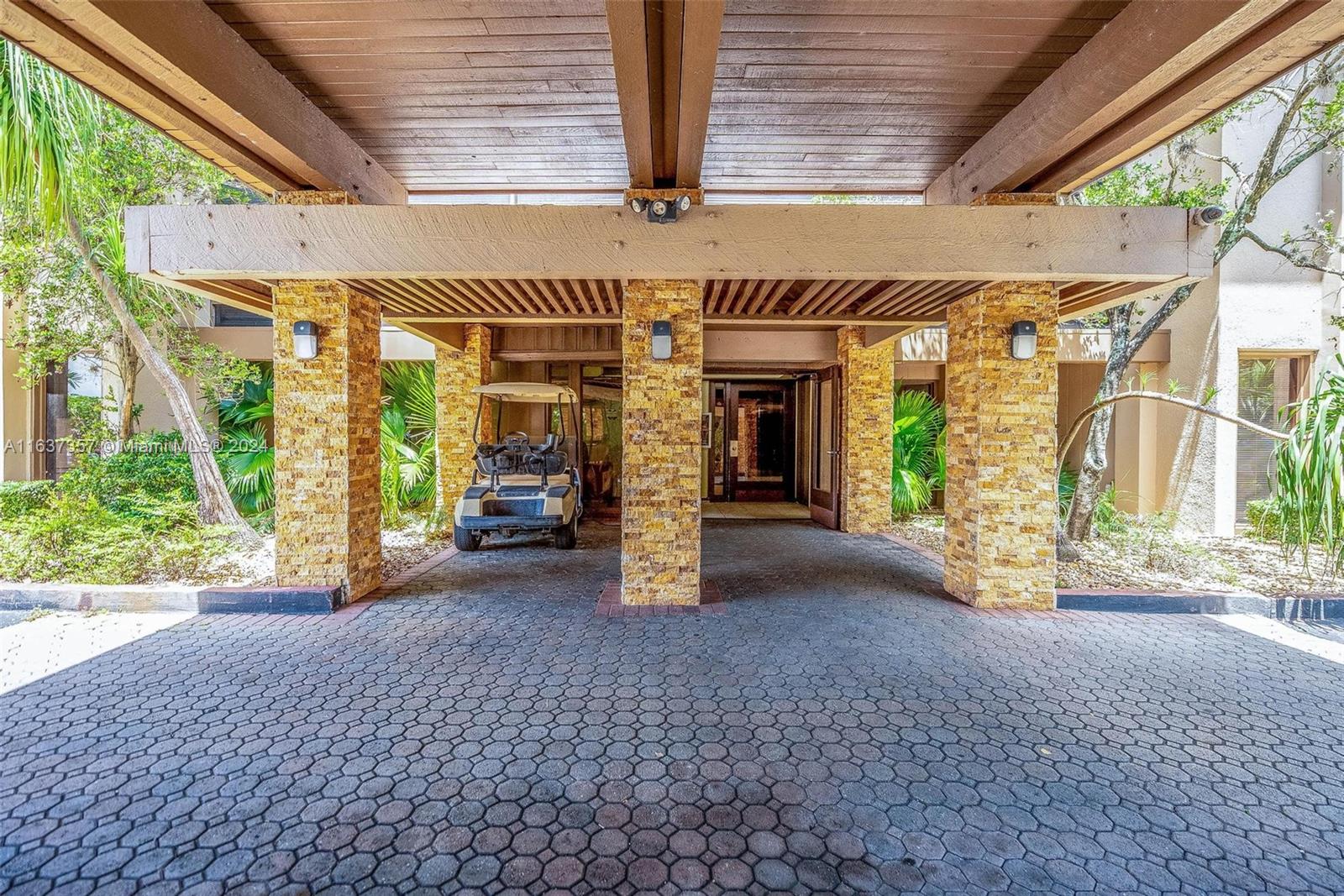 a view of a porch with furniture