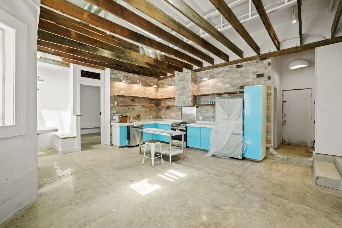 a view of a hallway with seating area