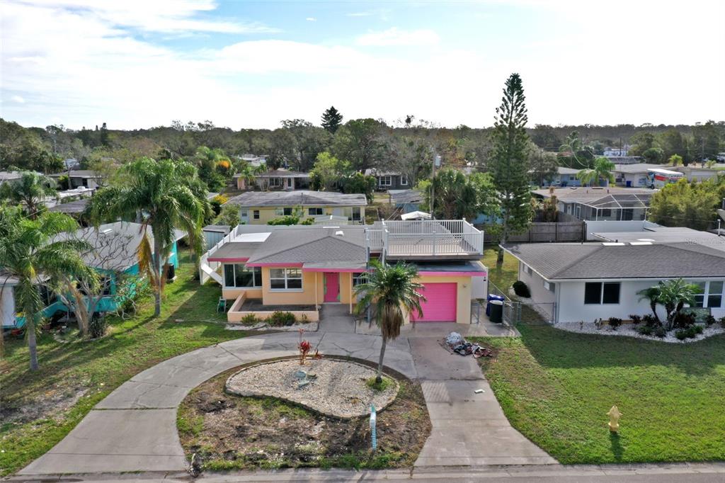 aerial view of a house with a garden