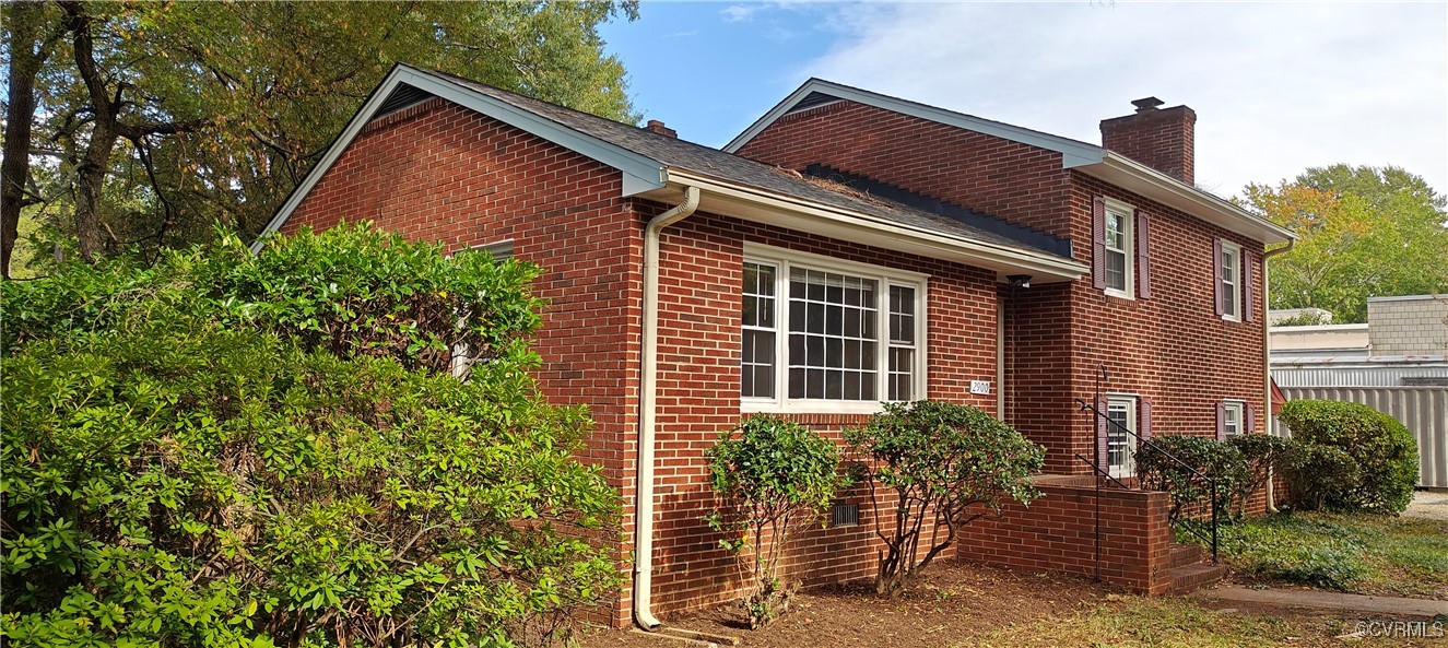 a view of house with a outdoor space