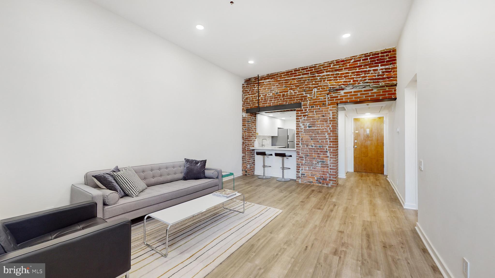 a view of livingroom with furniture and wooden floor