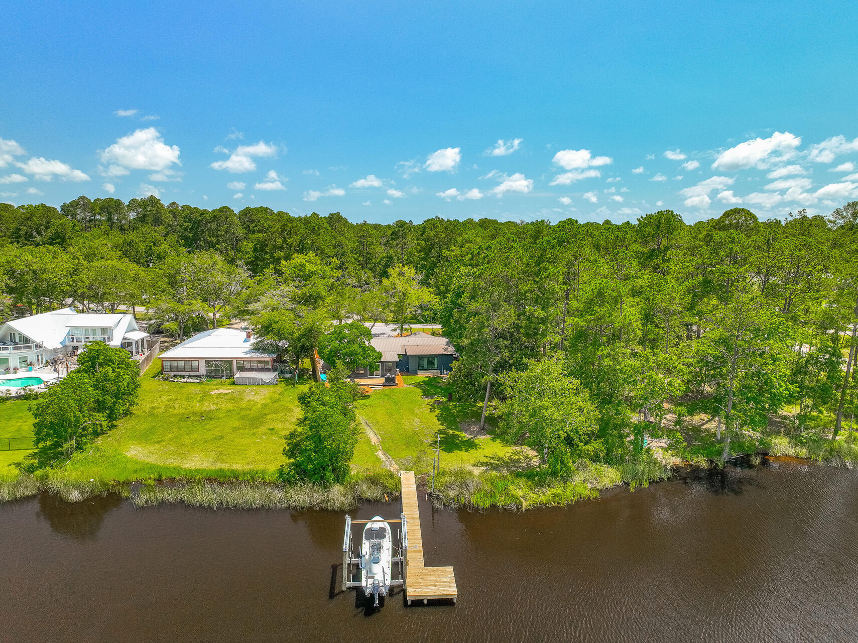 a view of a lake with a houses