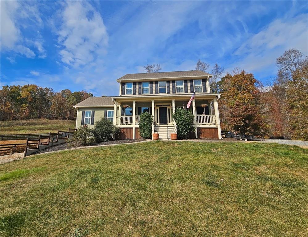 front view of a house with a yard