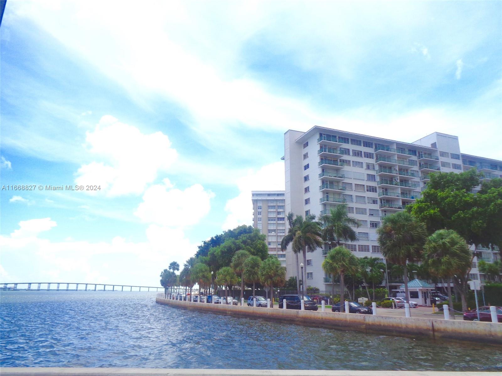 a view of a city with tall buildings