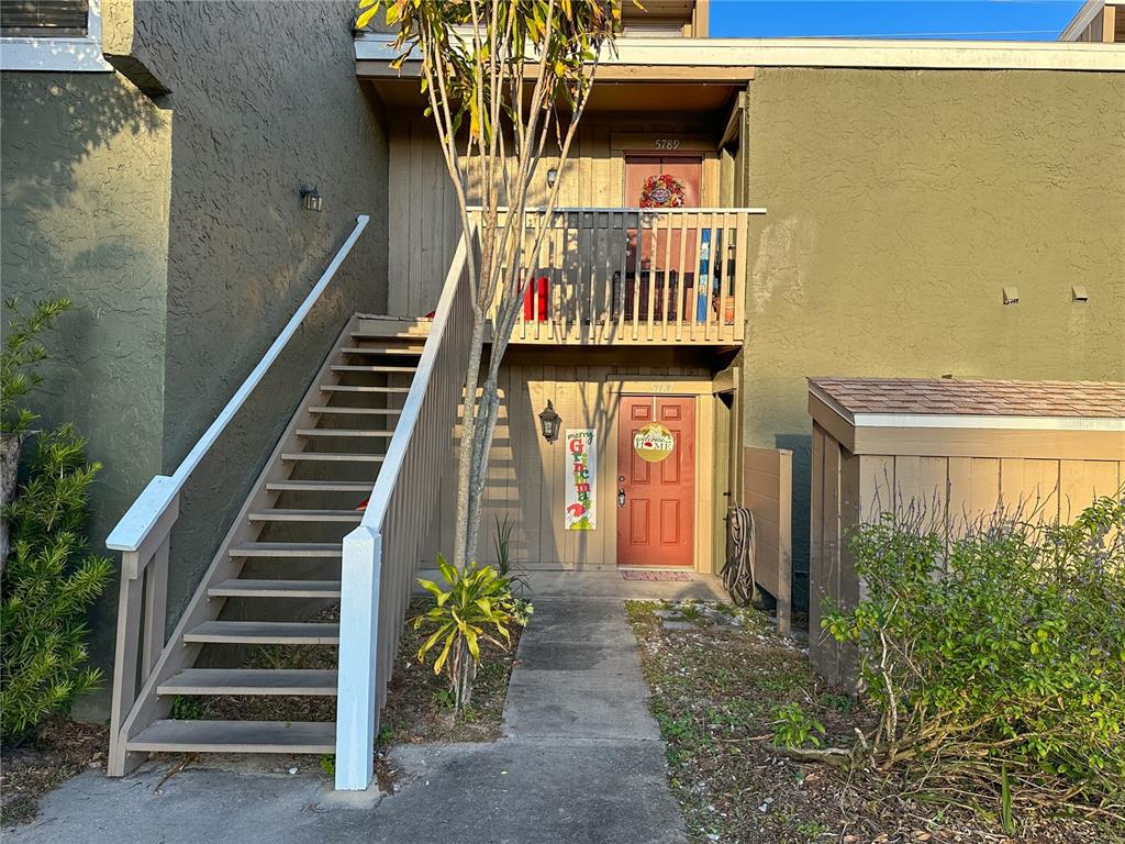 front view of a house with a deck