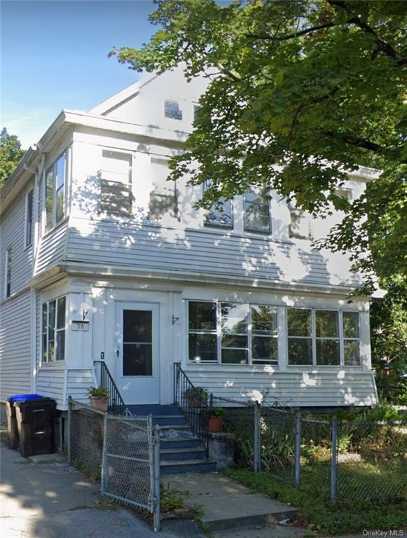 a front view of house with yard